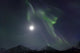 Aurora Borealis Or Northern Lights Above The Mountains Near Whitehorse Wall Mural