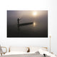 A Man Pushes His Dugout Canoe Along The Rapti River Wall Mural