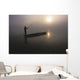 A Man Pushes His Dugout Canoe Along The Rapti River Wall Mural