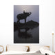 An Elephant With Its Mahout Stand At The Edge Of The Rapti River Wall Mural