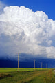 Power Lines With A Cumulonimbus Supercell Cloud Mass Wall Mural