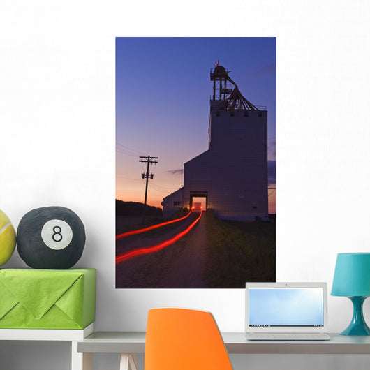 Streak Of Truck Lights And An Old Grain Elevator, Virden, Manitoba Wall Mural