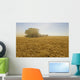 A Combine Harvester Works A Field Of Winter Wheat Wall Mural