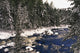Ouareau River And Snow Covered Evergreen Trees In Winter Wall Mural