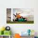 Shoot of football player and jump of goalkeeper on the field of Wall Mural