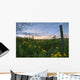 A Summer Evening Sky With Yellow Tansy Flowers And Barbed Wire Fence Wall Mural