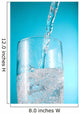 Stream Of Water Being Poured Into A Clear Glass Wall Mural