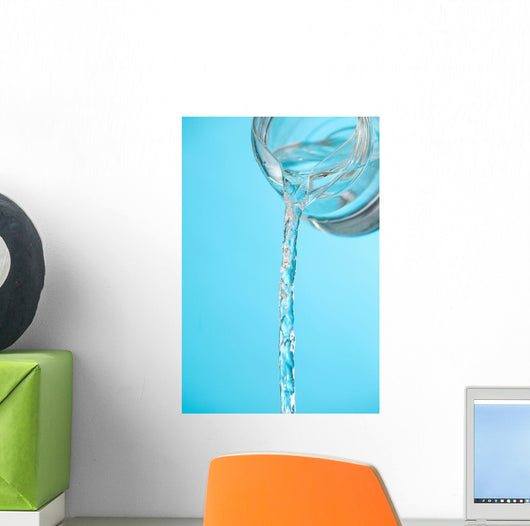 Stream Of Water Being Poured From A Pitcher Wall Mural