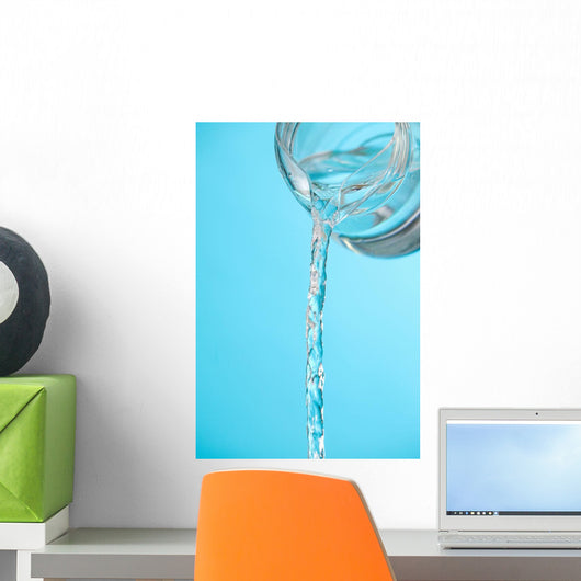 Stream Of Water Being Poured From A Pitcher Wall Mural