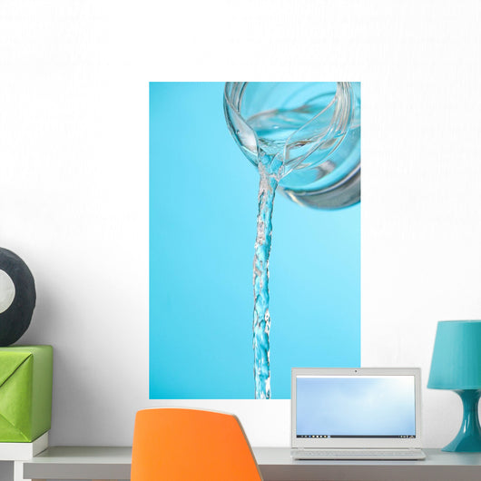 Stream Of Water Being Poured From A Pitcher Wall Mural