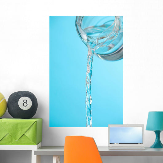 Stream Of Water Being Poured From A Pitcher Wall Mural