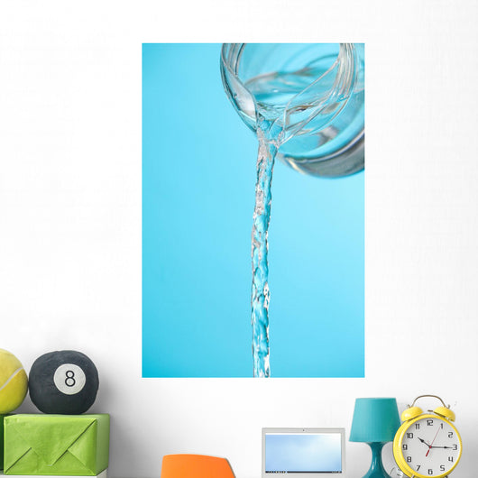 Stream Of Water Being Poured From A Pitcher Wall Mural