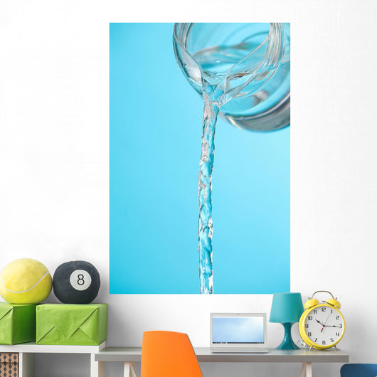 Stream Of Water Being Poured From A Pitcher Wall Mural