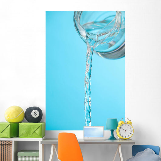 Stream Of Water Being Poured From A Pitcher Wall Mural