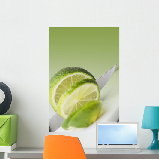 A Knife Cutting A Lime Wall Mural