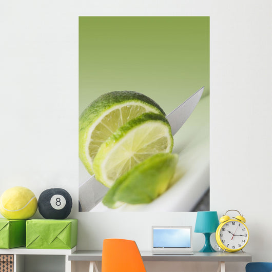 A Knife Cutting A Lime Wall Mural