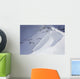 Skier On Crest Of Big Drop, Dwarfed By Mountain Wall Mural