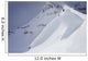 Skier On Crest Of Big Drop, Dwarfed By Mountain Wall Mural