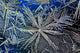Extreme Close Up Of Frost Crystal With Colourful Lighting Wall Mural