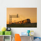 Locomotives Pulling Rail Hopper Cars Pass An Overhead Rail Signal Wall Mural