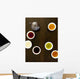Teapot And Different Types Of Tea In Cups On A Wood Table Wall Mural