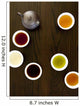 Teapot And Different Types Of Tea In Cups On A Wood Table Wall Mural
