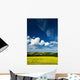 Dramatic Cumulus Clouds Over Canola Field Wall Mural