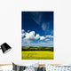 Dramatic Cumulus Clouds Over Canola Field Wall Mural