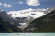 Mount Victoria And Lake Louise With Canoes Wall Mural