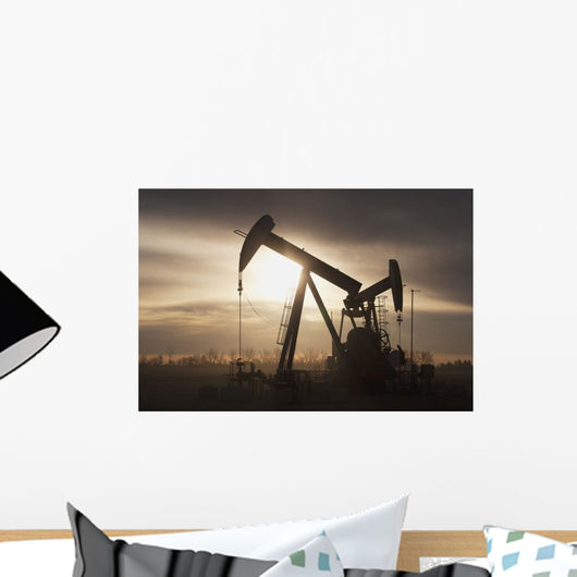 Silhouette Of Two Pump Jacks At Sunrise With Clouds Wall Mural