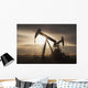 Silhouette Of Two Pump Jacks At Sunrise With Clouds Wall Mural