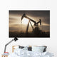 Silhouette Of Two Pump Jacks At Sunrise With Clouds Wall Mural