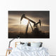 Silhouette Of Two Pump Jacks At Sunrise With Clouds Wall Mural