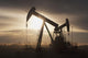 Silhouette Of Two Pump Jacks At Sunrise With Clouds Wall Mural
