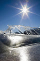 Ice Formations On A Frozen Lake Shoreline Wall Mural