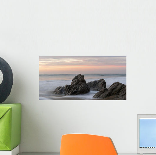 Mist Surrounding Rocks In The Ocean At The Coast At Sunset Wall Mural
