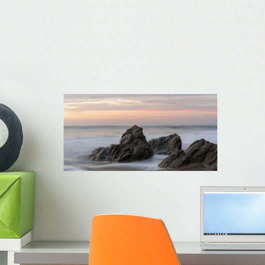 Mist Surrounding Rocks In The Ocean At The Coast At Sunset Wall Mural