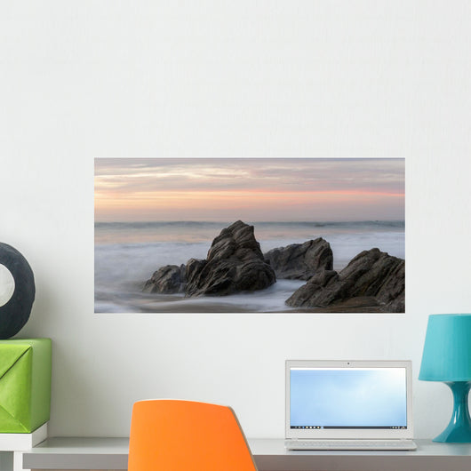 Mist Surrounding Rocks In The Ocean At The Coast At Sunset Wall Mural