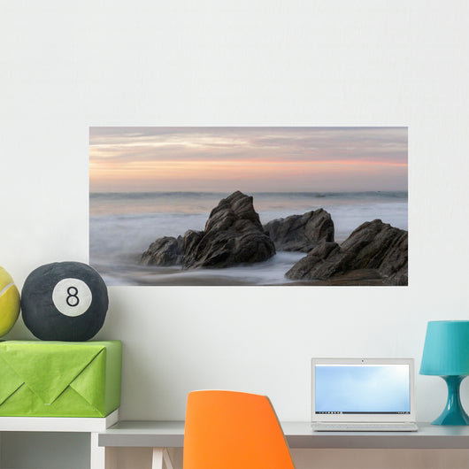 Mist Surrounding Rocks In The Ocean At The Coast At Sunset Wall Mural