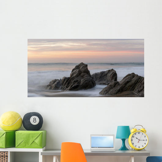 Mist Surrounding Rocks In The Ocean At The Coast At Sunset Wall Mural
