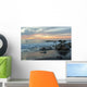 Water Washing Up On The Beach Around The Rocks At Sunset Wall Mural