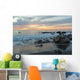 Water Washing Up On The Beach Around The Rocks At Sunset Wall Mural