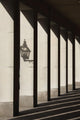 Shadows Cast By Sunlight Shining On Pillars And A Lantern Wall Mural
