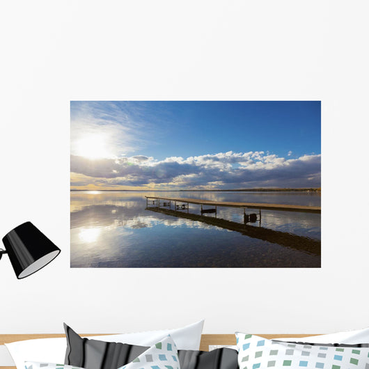 A Dock Leading Out Into The Lake At Sunrise Wall Mural