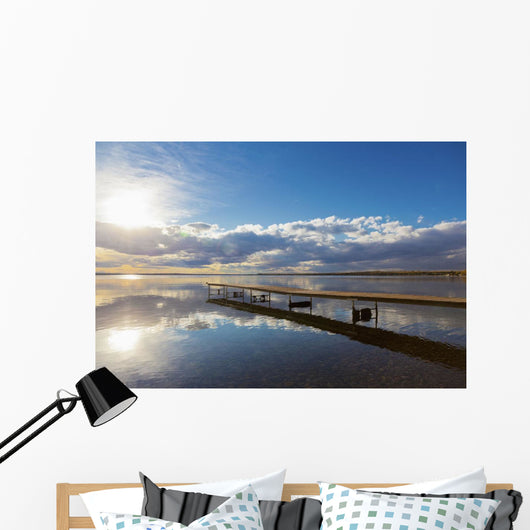A Dock Leading Out Into The Lake At Sunrise Wall Mural