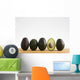 A Row Of Avocados Standing Upright On A Wooden Board With One Cut Wall Mural