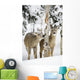 Two Young Deer In A Snow Covered Forest Chewing On Tree Bark Wall Mural