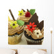 Close-Up Of Three Chocolate Cupcakes With Candy Flowers Wall Mural
