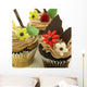 Close-Up Of Three Chocolate Cupcakes With Candy Flowers Wall Mural