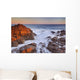 California, Malibu, Sunset over rocky ocean coastline Wall Mural